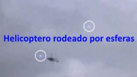 Helicoptero-rodeado-por-esferas-luz.jpg